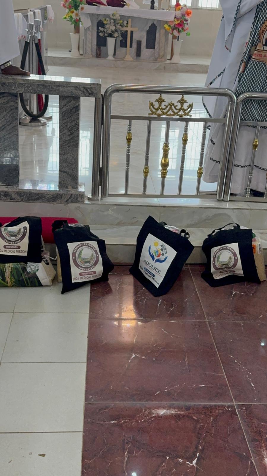 Branded relief bags lined up at the altar of a community church